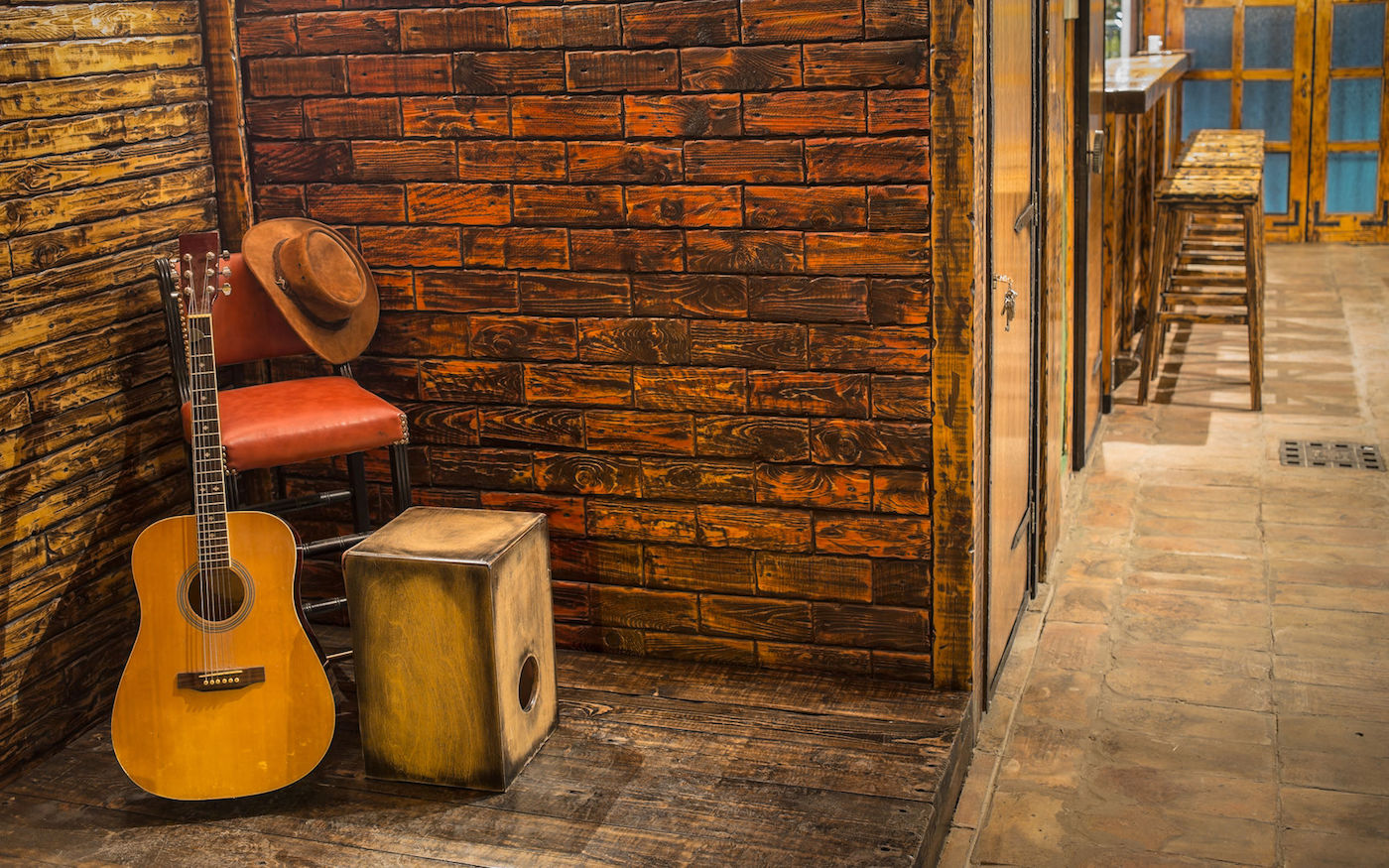 46417483 - music instruments on wooden stage in pub